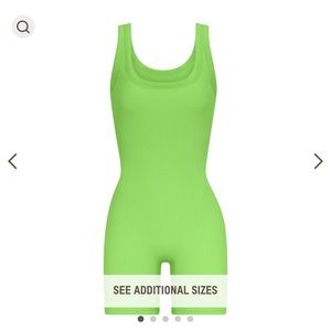 Neon green onesie size medium worn 3/4 times.